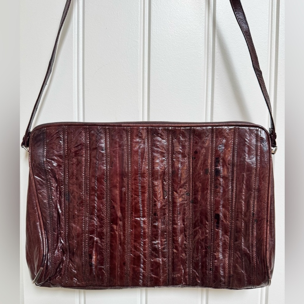 Vintage Brown Eel Skin Shoulder Purse. 10” by 7.5” by 0.5” with strap drop 15”.